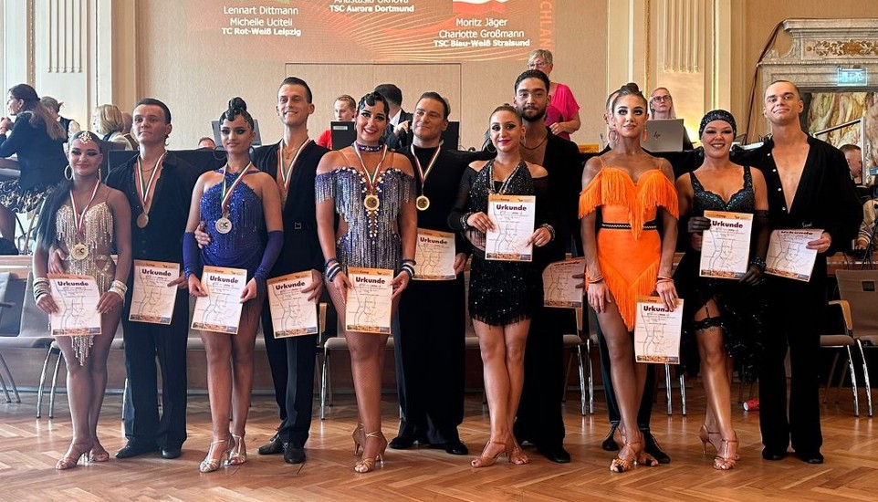 Tuigunov and Ukhova Dominate Adults D Standard; Viohl and Azoulai Claim Adults A Latin Title in Germany